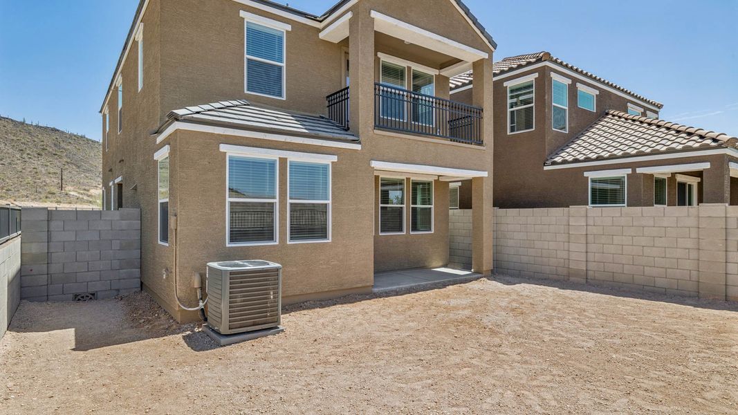 Exterior details and patio area of a home in The Buttes at Mystic, Peoria (Image 4). Exterior details and patio area of a home in The Buttes at Mystic, Peoria (Image 4).