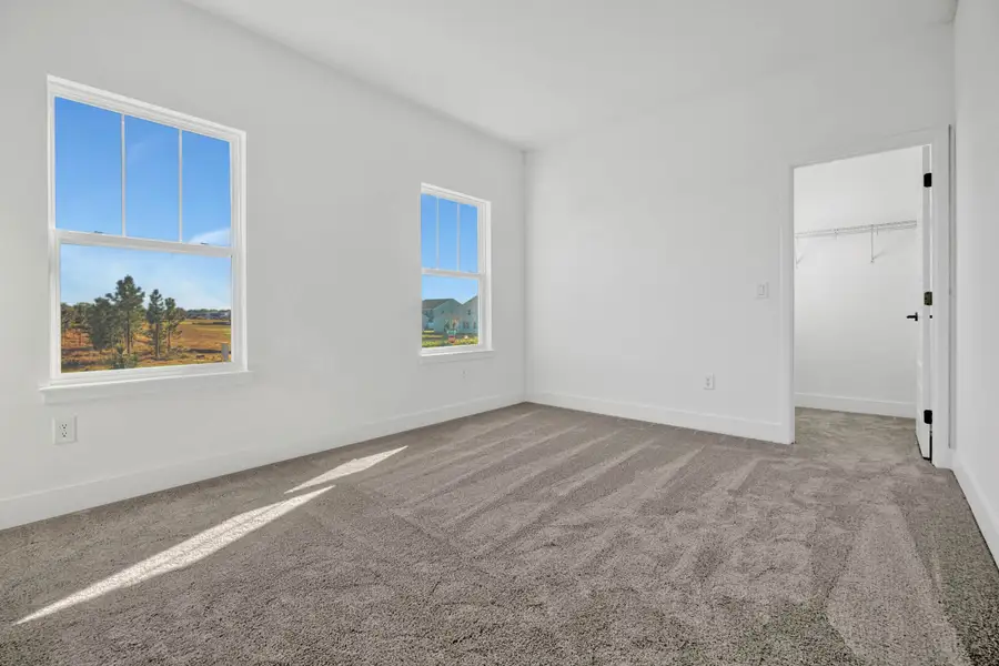 Representative unfurnished interior of a home built from the Whitney by Rockwell Homes in Harvest at Ovation - Townhomes, Winter Garden (Image 17). Representative unfurnished interior of a home built from the Whitney by Rockwell Homes in Harvest at Ovation - Townhomes, Winter Garden (Image 17).