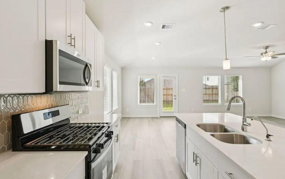 Photo is not of the actual home, but is an inspirational photo of builder’s model home and may depict options, furnishings, and/or decorator features that are not included Photo is not of the actual home, but is an inspirational photo of builder’s model home and may depict options, furnishings, and/or decorator features that are not included