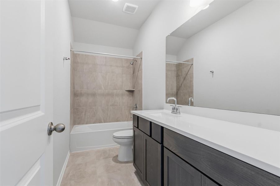 Furnished interior view inside a new home in The Woodlands Hills, Willis (Image 10).