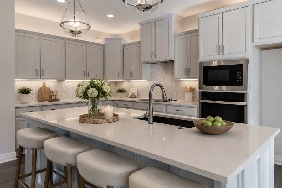 Representative furnished interior of a home built from the Salerno by Perfection Builders in The Courtyards at Cornerstone, Andover (Image 4).