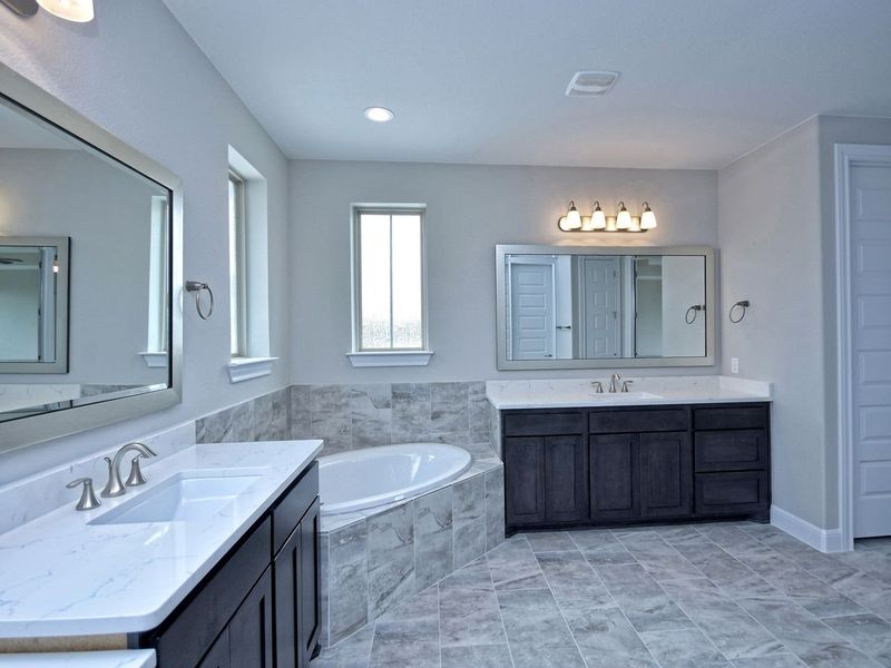 Representative furnished interior of a home built from the San Simeon I by Giddens Homes in Clearwater Ranch, Liberty Hill (Image 302).