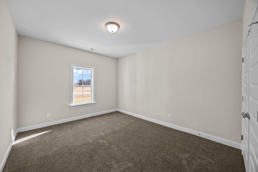 Spacious, unfurnished interior of a new home in Kennedy's Crossing, Grimesland (Image 29).