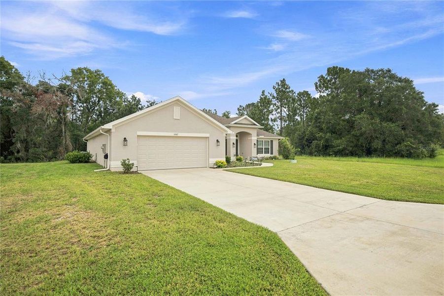 Front exterior of a new home in , Ocala, FL, highlighting curb appeal (Image 21). Front exterior of a new home in , Ocala, FL, highlighting curb appeal (Image 21).