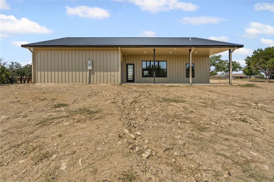 Front exterior of a new home in , Springtown, TX, highlighting curb appeal (Image 18). Front exterior of a new home in , Springtown, TX, highlighting curb appeal (Image 18).