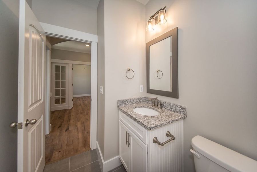 Representative furnished interior of a home built from the Beaumont Elite by Enchanted Homes in Pointe Summit, Slater-Marietta (Image 7).