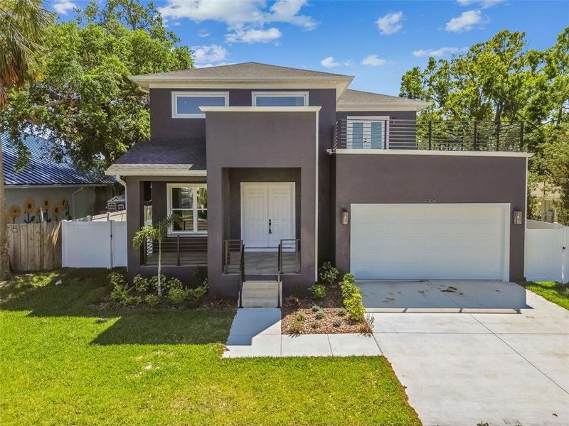 Front exterior of a new home in , Tampa, FL, highlighting curb appeal (Image 22). Front exterior of a new home in , Tampa, FL, highlighting curb appeal (Image 22).