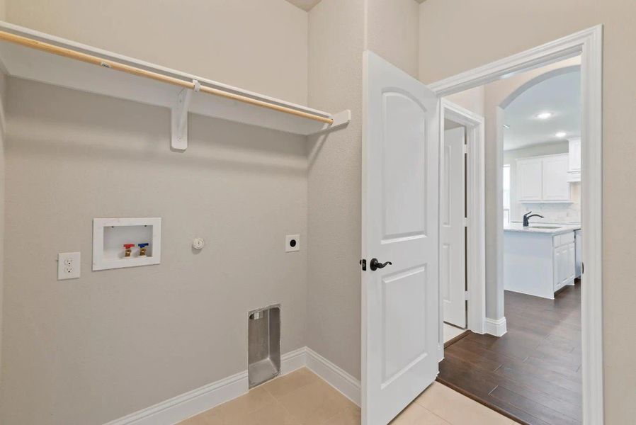 Laundry Room | Concept 3015 at Silo Mills - Signature Series in Joshua, TX by Landsea Homes