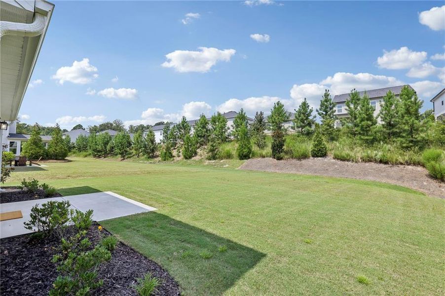 Exterior details and patio area of a home in Twin Lakes Single-Family Homes, Hoschton (Image 24).