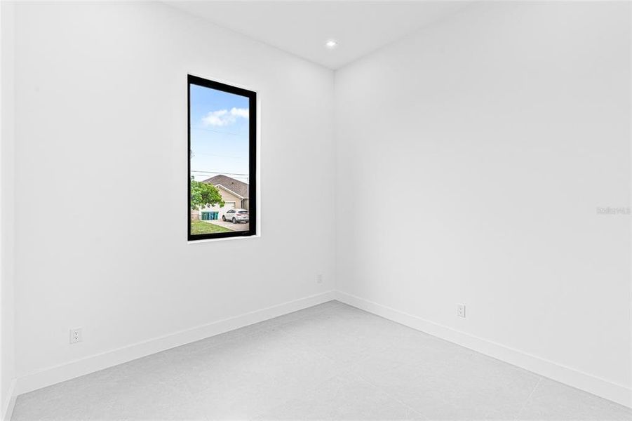 Spacious, unfurnished interior of a new home in , Port Charlotte (Image 72).