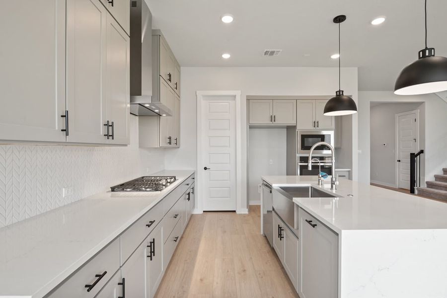 Furnished interior view inside a new home in Arbor Collection at Lariat, Liberty Hill (Image 9). Furnished interior view inside a new home in Arbor Collection at Lariat, Liberty Hill (Image 9).