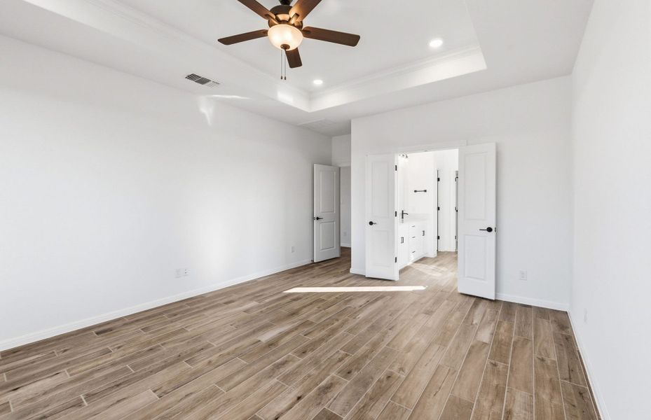 Spacious, unfurnished interior of a new home in Saddleback at Santa Rita Ranch, Liberty Hill (Image 52).