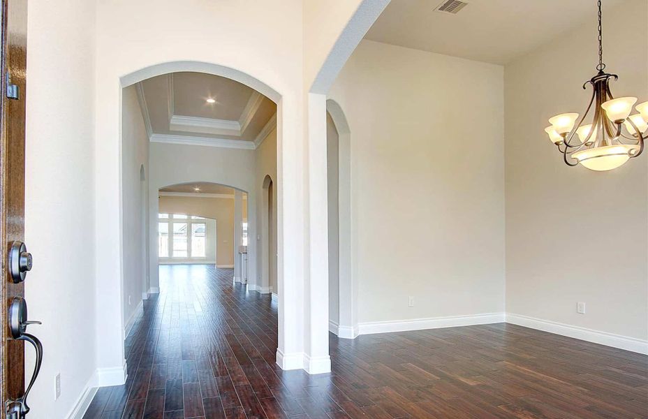 Representative unfurnished interior of a home built from the 3710 by Ravenna Homes in Artavia 70′, Conroe (Image 18).