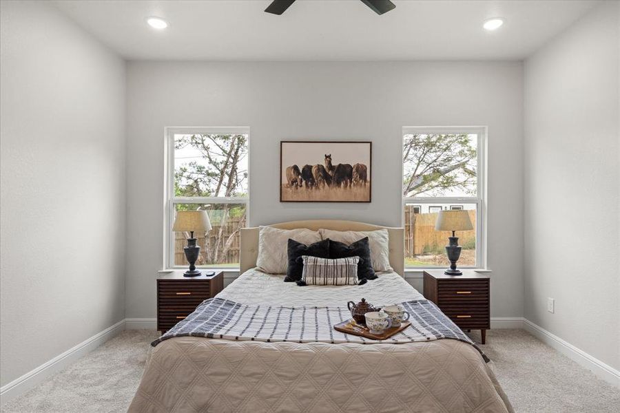The Primary Bedroom is located downstairs and has an ensuite Bathroom.