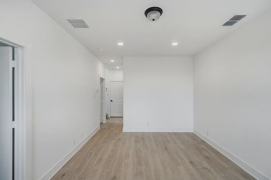 Representative unfurnished interior of a home built from the Athena by Chesmar Homes in Prominence Urban, San Antonio (Image 35).