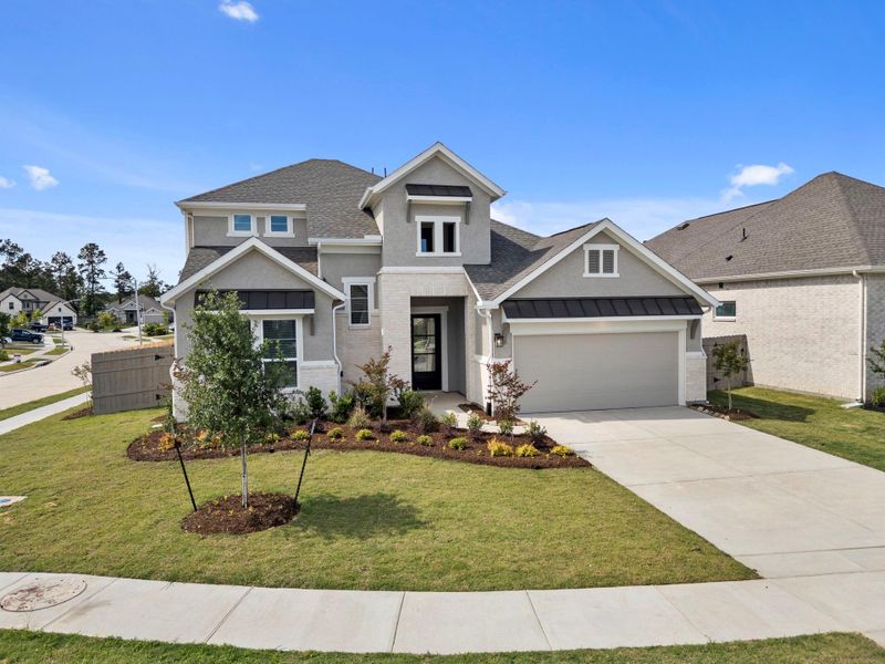 Front exterior of a new home in Artavia, Conroe, TX, highlighting curb appeal (Image 18).