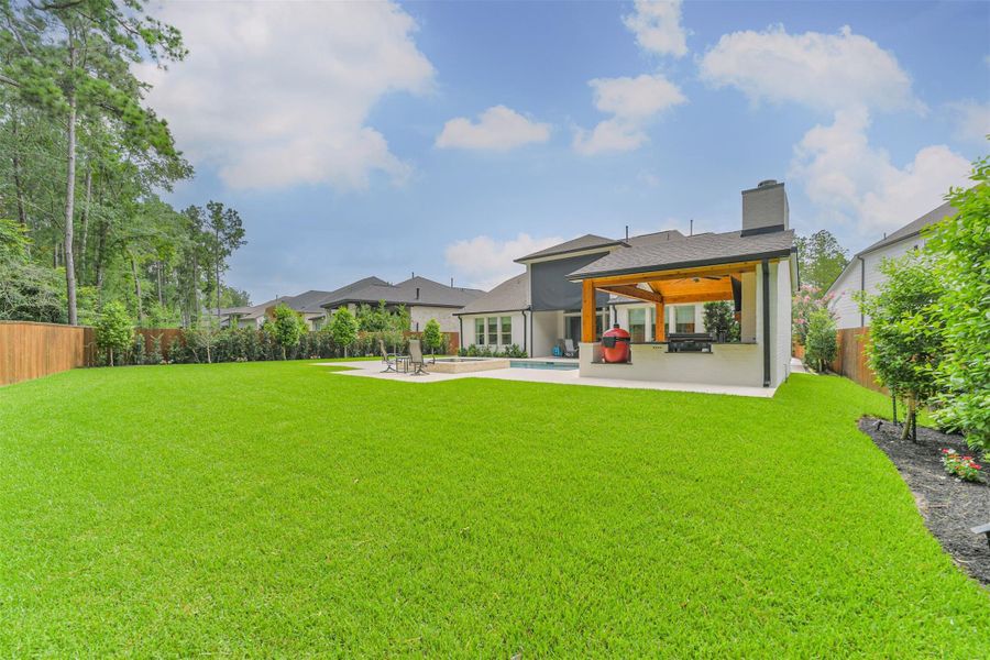 Exterior details and patio area of a home in Woodforest – 60', Montgomery (Image 28).