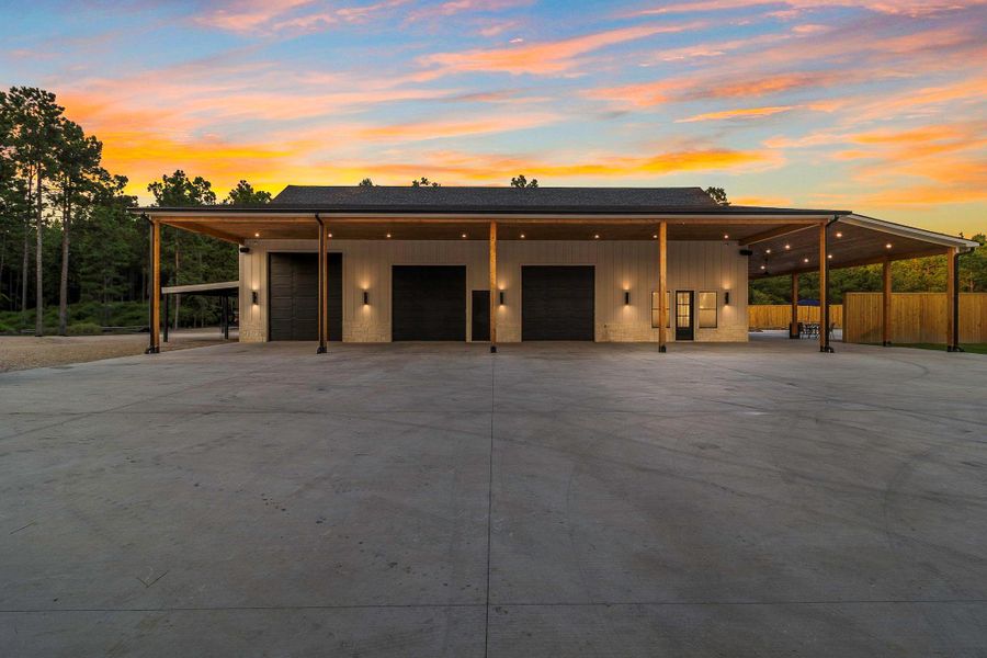Front exterior of a new home in , Onalaska, TX, highlighting curb appeal (Image 18).
