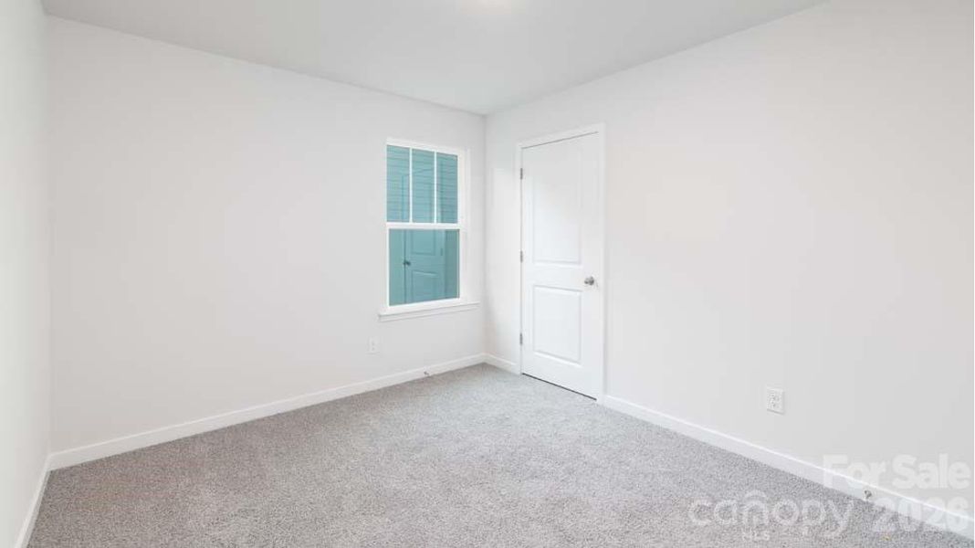 Spacious, unfurnished interior of a new home in Reedy Creek Preserve, Charlotte (Image 17).