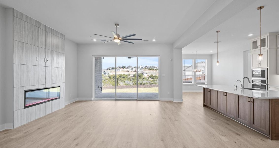 Representative unfurnished interior of a home built from the Raegan by Chesmar Homes in Sweetwater, Austin (Image 8).