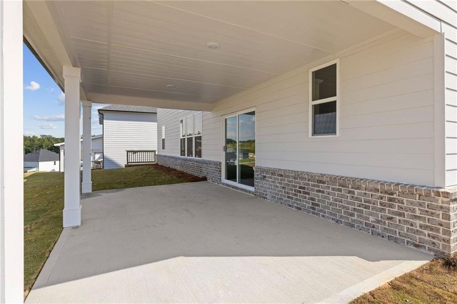 Exterior details and patio area of a home in The Estates at Gainesville Township, Gainesville (Image 10). Exterior details and patio area of a home in The Estates at Gainesville Township, Gainesville (Image 10).