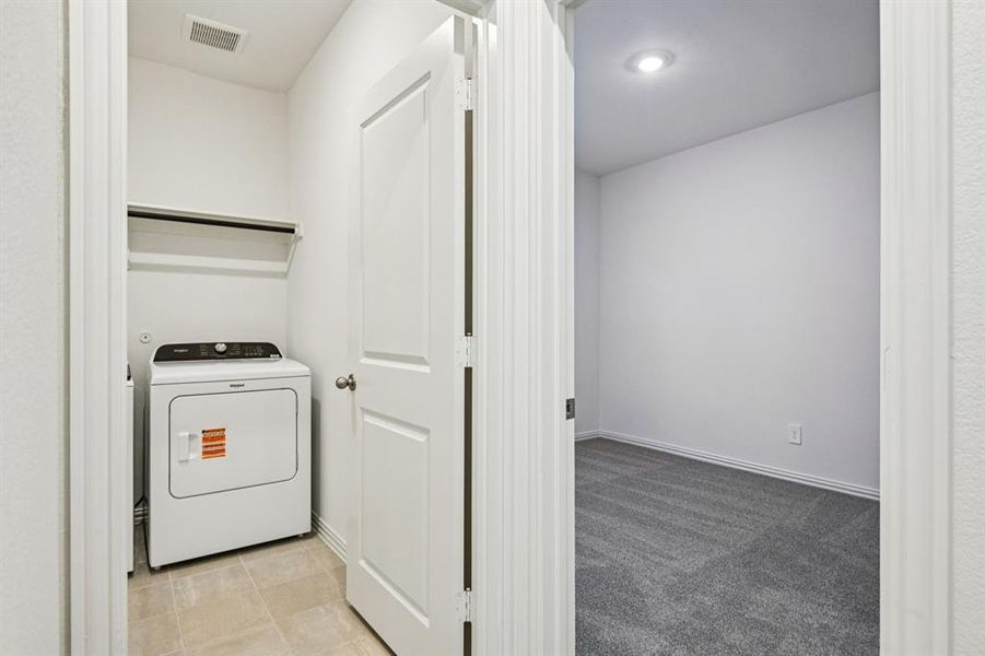 Furnished interior view inside a new home in Lakehaven - Spring Series, Farmersville (Image 17).
