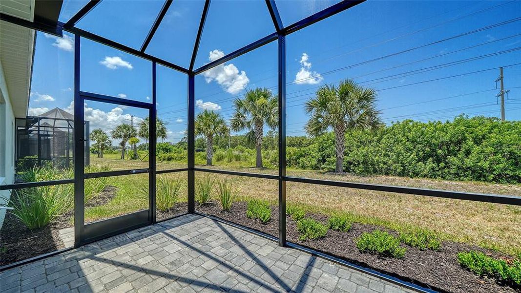 Exterior details and patio area of a home in Windward Real Estate and Homes for Sale in Sarasota, FL - Neal Communities, Lakewood Ranch (Image 3).