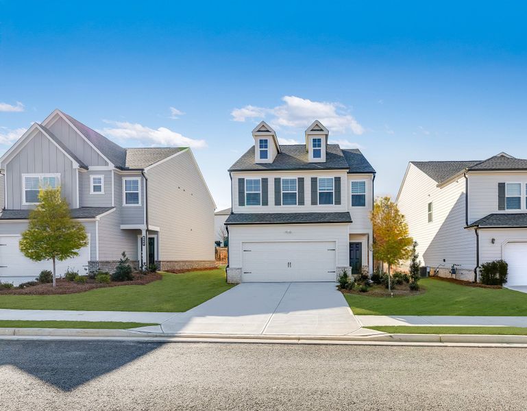 Front exterior of a new home in Timber Ridge, Douglasville, GA, highlighting curb appeal (Image 1). Front exterior of a new home in Timber Ridge, Douglasville, GA, highlighting curb appeal (Image 1).