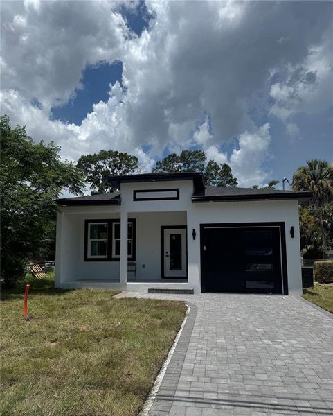 Front exterior of a new home in , Safety Harbor, FL, highlighting curb appeal (Image 1). Front exterior of a new home in , Safety Harbor, FL, highlighting curb appeal (Image 1).
