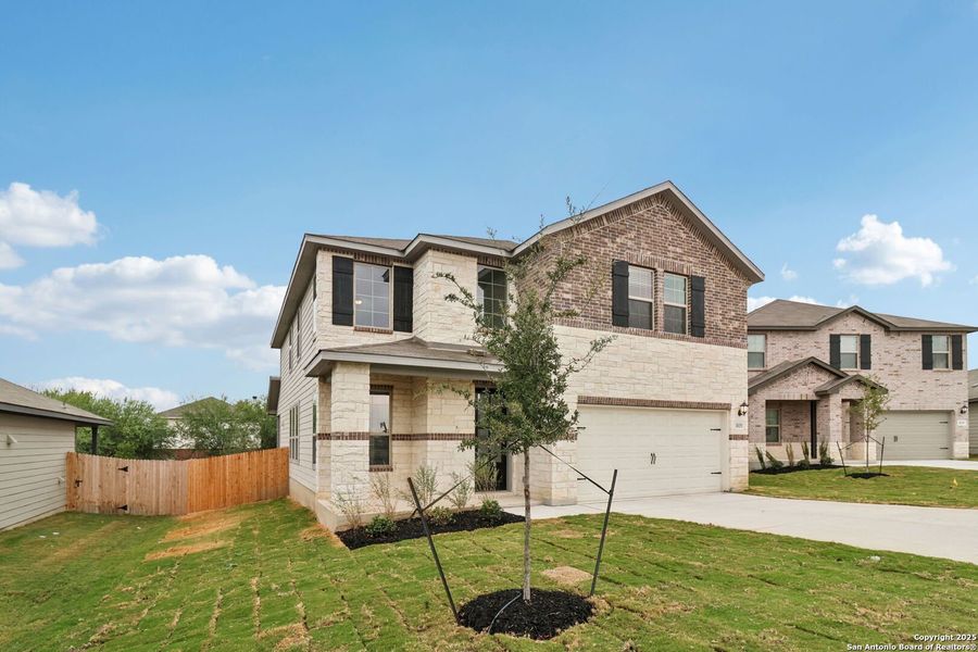 Front exterior of a new home in Royal Crest, San Antonio, TX, highlighting curb appeal (Image 24). Front exterior of a new home in Royal Crest, San Antonio, TX, highlighting curb appeal (Image 24).