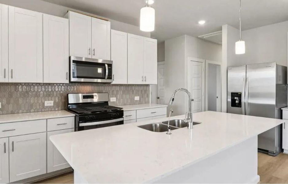 Photo is not of the actual home, but is an inspirational photo of builder’s model home and may depict options, furnishings, and/or decorator features that are not included Photo is not of the actual home, but is an inspirational photo of builder’s model home and may depict options, furnishings, and/or decorator features that are not included