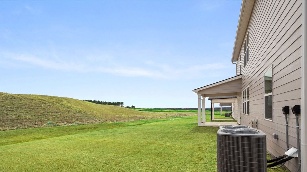 Exterior details and patio area of a home in Highland Hills, Graniteville (Image 3).