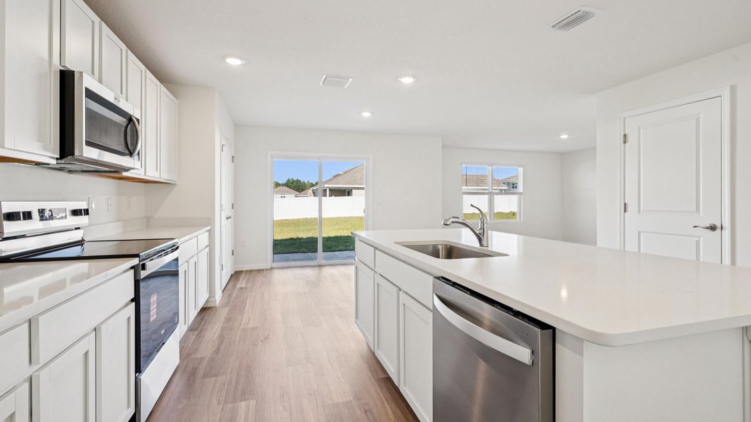 Representative furnished interior of a home built from the Ensley by D.R. Horton in Sandal Key, Weeki Wachee (Image 15).