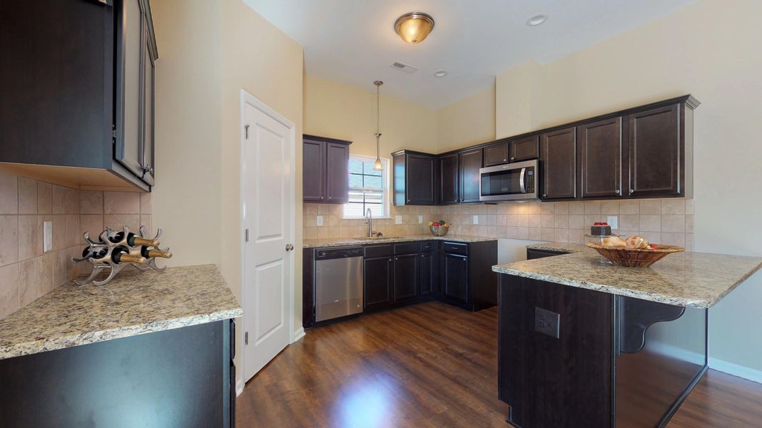 Representative furnished interior of a home built from the Wyatt by Bill Clark Homes in Davenport Farms, Winterville (Image 9).