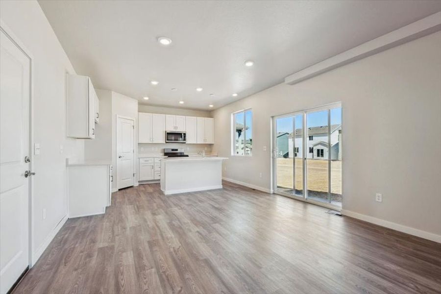 A kitchen with white cabinets. A kitchen with white cabinets.
