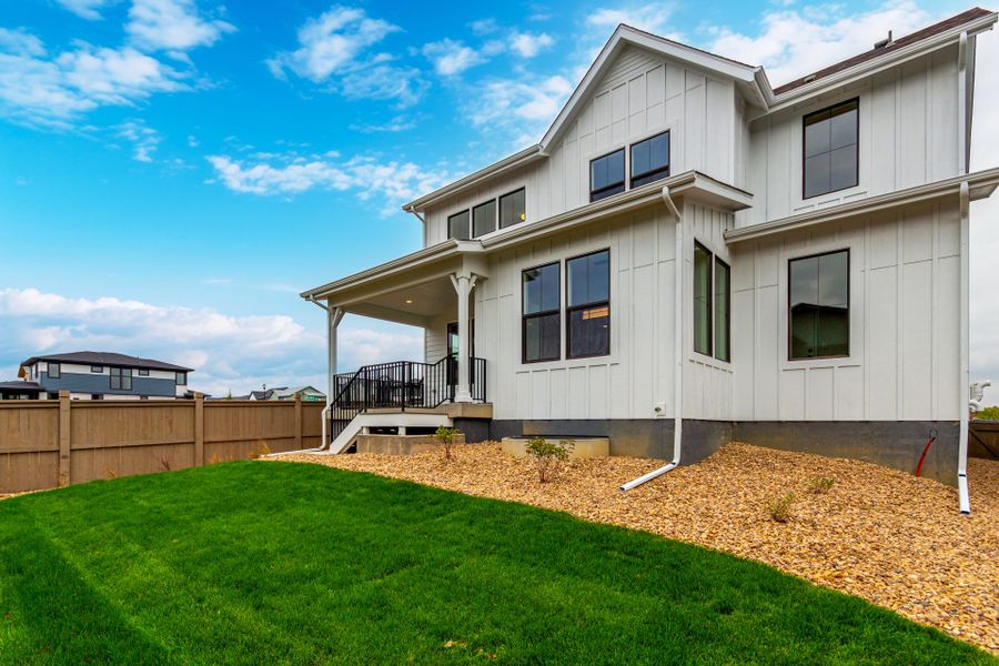 Exterior details and patio area of a home in West Grange, Longmont (Image 32).