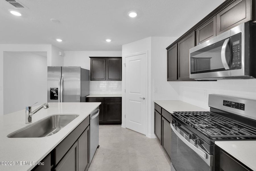 Furnished interior view inside a new home in Wells Landing, Jacksonville (Image 8).