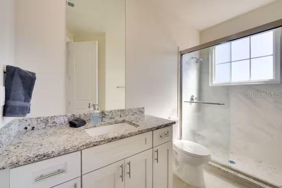 Furnished interior view inside a new home in , Kissimmee (Image 17). Furnished interior view inside a new home in , Kissimmee (Image 17).