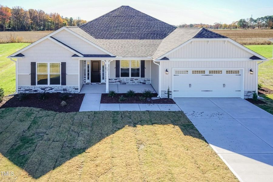 Representative exterior photo of a completed home built from the 2906 by Adams Homes in Norris Landing, Snellville, GA (Image 23).