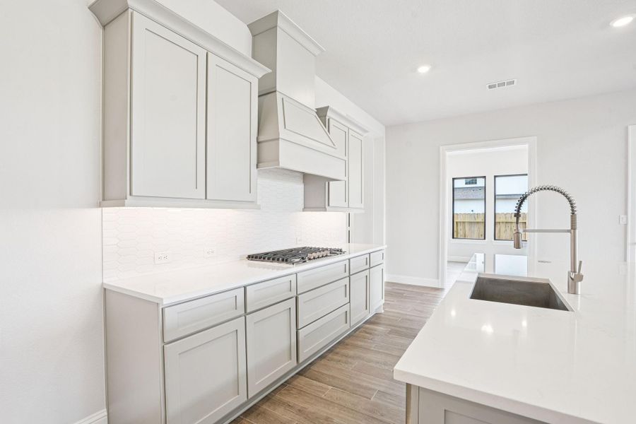 Furnished interior view inside a new home in Del Bello Lakes 60', Manvel (Image 16).