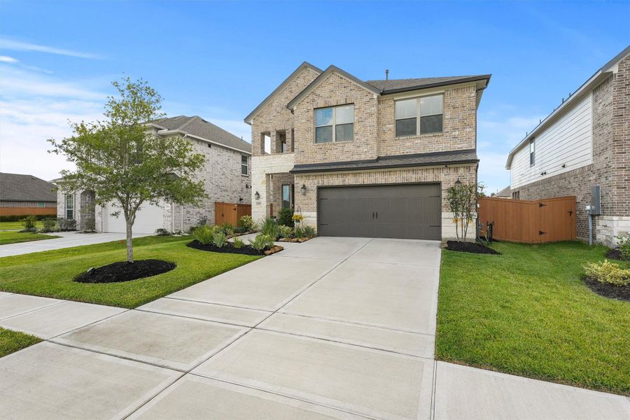 Double wide driveway and beautiful curb appeal Double wide driveway and beautiful curb appeal