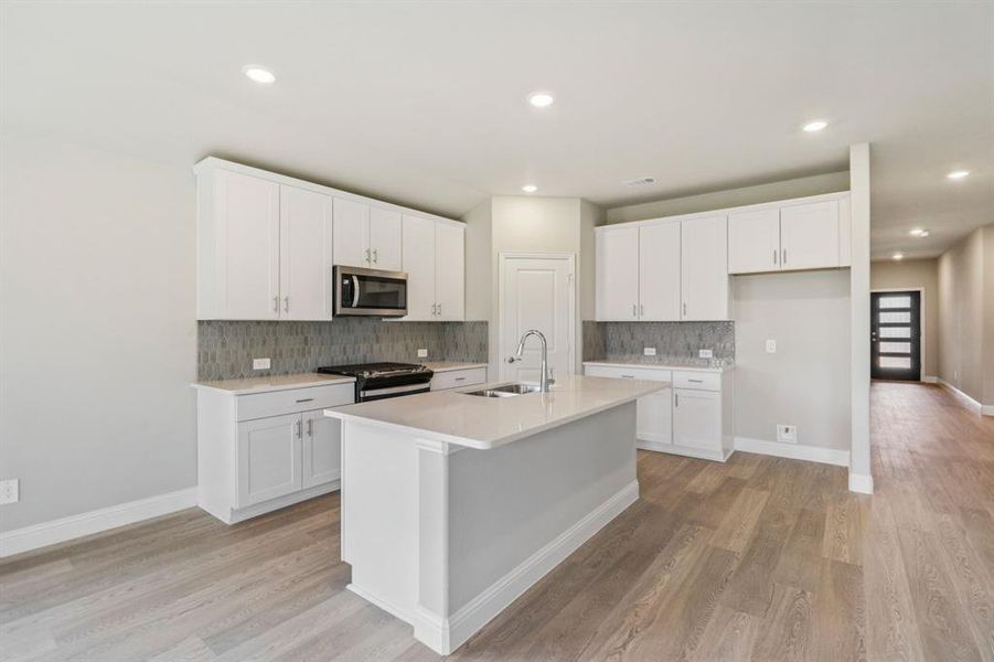 Photo is not of the actual home, but is an inspirational photo of builder’s model home and may depict options, furnishings, and/or decorator features that are not included.