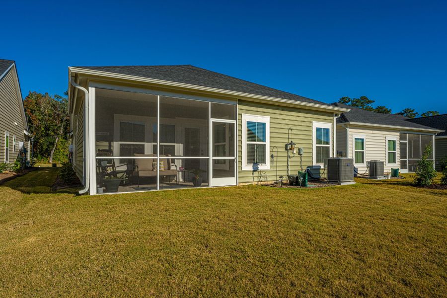 Exterior details and patio area of a home in Horizons at Summers Corner | 55+: The Cottages, Summerville (Image 3).