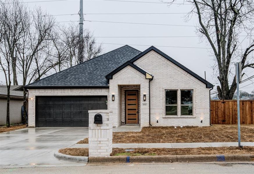 View of front of home with a garage