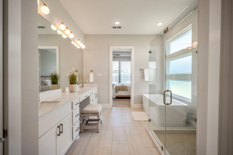 Spacious, serene and thoughtfully designed, this impressive ensuite connects directly to a double walk-in closet and offers plenty of room to move through your morning routines or relax at the end of the day.