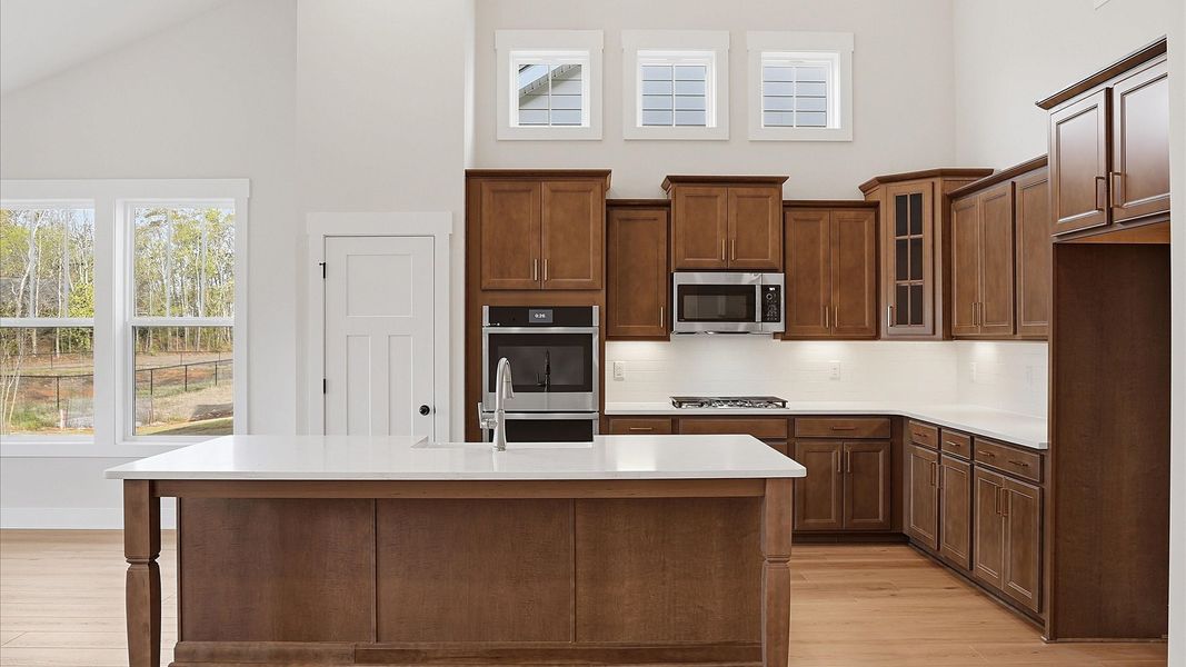 First-rate kitchen with a center island and superior cabinetry in a thoughtfully designed space located in Greenville, SC