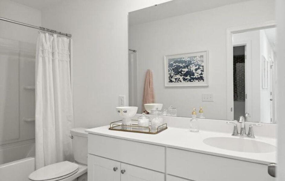 Furnished interior view inside a new home in Sweetgrass at Summers Corner, Summerville (Image 13).