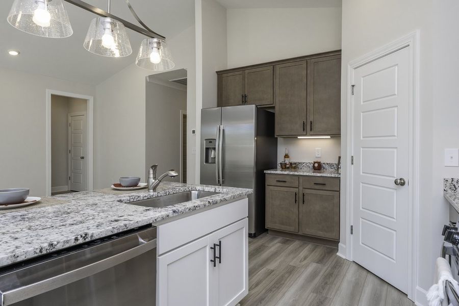 Representative furnished interior of a home built from the The Hunter by Cothran Homes in Holly Ridge, Greenville (Image 8).