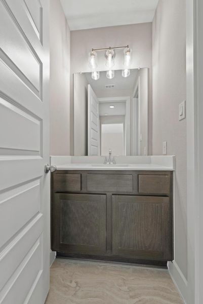 Furnished interior view inside a new home in Bridgeland, Cypress (Image 10).