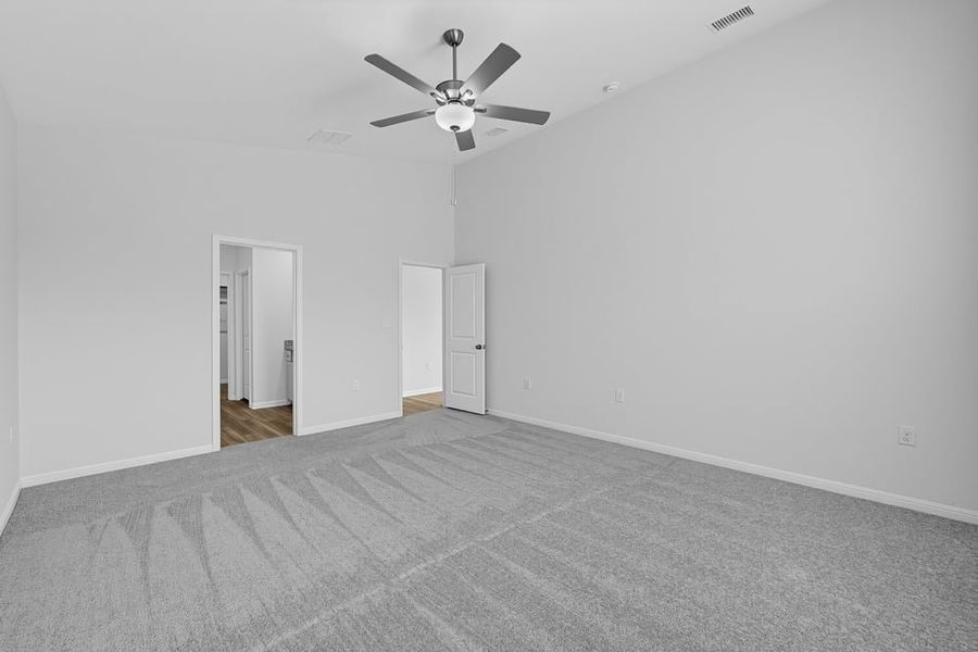 Representative unfurnished interior of a home built from the Warbler by Taylor Morrison in Emory Crossing, Hutto (Image 12).